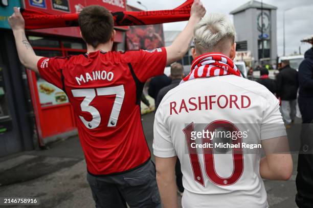 Marcus Rashford and Kobbie Mainoo replica shirts are seen before the Premier League match between Manchester United and Liverpool FC at Old Trafford...