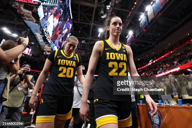 Caitlin Clark of the Iowa Hawkeyes walks off the court after losing to the South Carolina Gamecocks in the 2024 NCAA Women's Basketball Tournament...