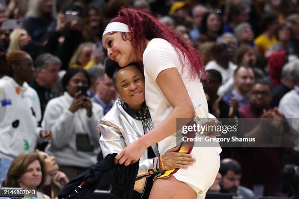 Kamilla Cardoso celebrates with head coach Dawn Staley of the South Carolina Gamecocks after beating the Iowa Hawkeyes in the 2024 NCAA Women's...
