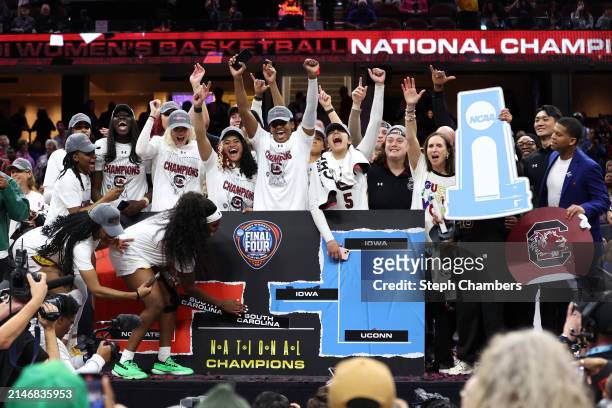 The South Carolina Gamecocks celebrate after beating the Iowa Hawkeyes in the 2024 NCAA Women's Basketball Tournament National Championship at Rocket...