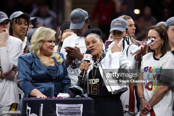 S Holly Rowe interviews head coach Dawn Staley of the South Carolina Gamecocks after South Carolina beat the Iowa Hawkeyes in the 2024 NCAA Women's...