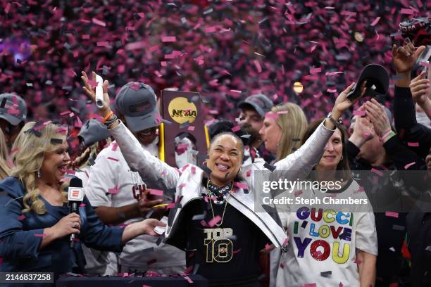 Head coach Dawn Staley of the South Carolina Gamecocks celebrates as the confetti falls after beating Iowa Hawkeyes in the 2024 NCAA Women's...