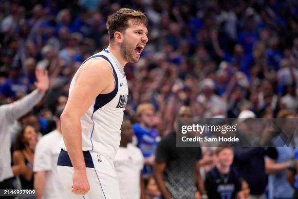 Luka Doncic of the Dallas Mavericks celebrates after a score in overtime against the Houston Rockets at American Airlines Center on April 07, 2024 in...