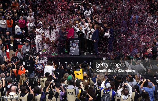 The South Carolina Gamecocks celebrate after beating the Iowa Hawkeyes in the 2024 NCAA Women's Basketball Tournament National Championship at Rocket...