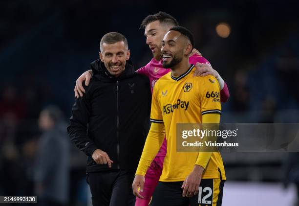 Gary O'Neil, Manager of Wolverhampton Wanderers, interacts with Jose Sa and Matheus Cunha of Wolverhampton Wanderers following the Premier League...