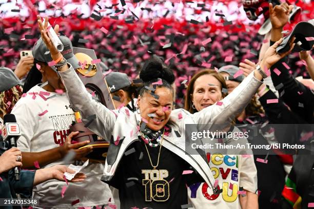 Head coach Dawn Staley of the South Carolina Gamecocks is showered with confetti after defeating the Iowa Hawkeyes 87-75 at the 2024 NCAA Women's...