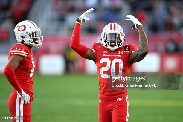 Gareon Conley of the DC Defenders celebrates with teammates after defeating the Houston Roughnecks 23-18 at Audi Field on April 07, 2024 in...