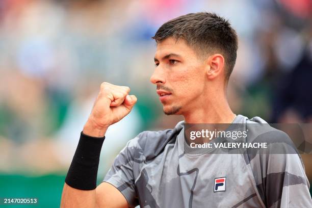 Australia's Alexei Popyrin reacts after winning a point as he plays against Russia's Andrey Rublev during their Monte Carlo ATP Masters Series...