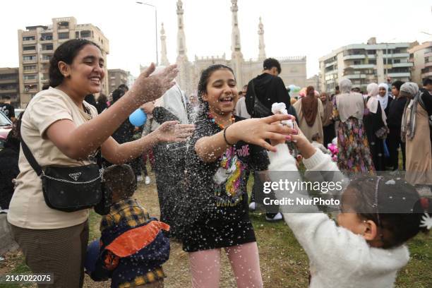 Muslims are celebrating after the Eid al-Fitr prayer at Al Seddik Mosque in the Heliopolis area of Cairo, Egypt, on April 10, 2024. Muslims around...