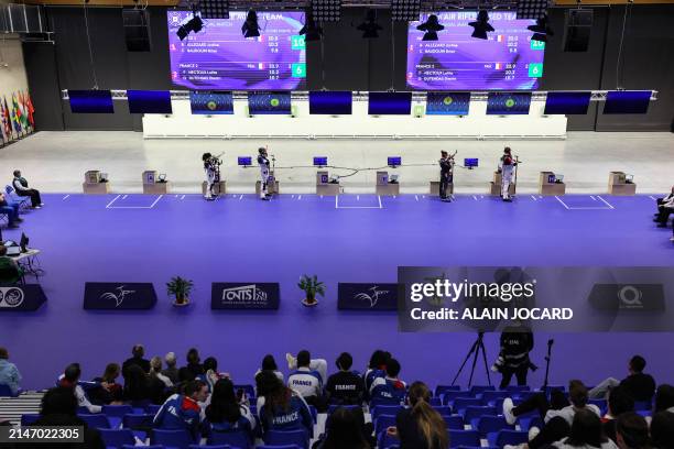 French athletes Justine Allezard, Brian Baudoin, Lolita Nectoux and Dimitri Dutendas compete during the 10 meters air rifle mixed team gold medal...