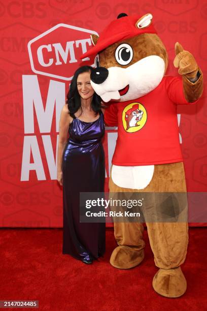 Leslie Fram, Senior VP of Music Strategy for CMT, and Buc-ee attend the 2024 CMT Music Awards at Moody Center on April 07, 2024 in Austin, Texas.