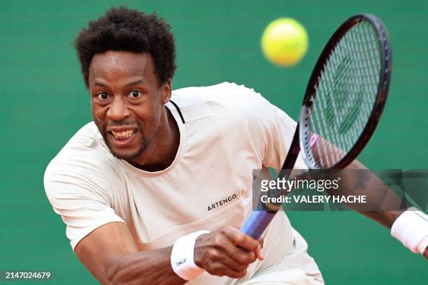 France's Gael Monfils plays a forehand return to Russia's Daniil Medvedev during their Monte Carlo ATP Masters Series Tournament round of 32 tennis...