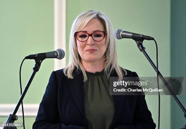 Sinn Fein Vice President and Northern Ireland First Minister Michelle O'Neill talks to invited guests as she appears at St Comgall's as Sinn Fein...