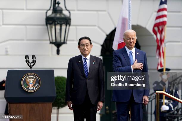 President Joe Biden, right, at an arrival ceremony with Fumio Kishida, Japan's prime minister, left, during a state visit on the South Lawn of the...