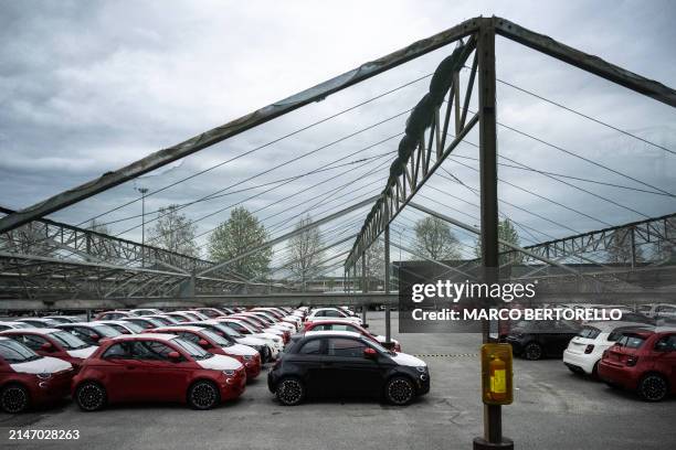 Fiat 500 are parked at the Mirafiori Stellantis' factory in Turin, on April 10, 2024. To meet the growing demand for electrified vehicles and the...