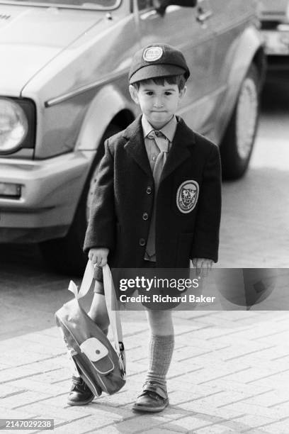 Nineties young schoolboy arrives at Bury Lawn School, on 21st September 1989, in Milton Keynes, England. Bury Lawn School was renamed The Webber...