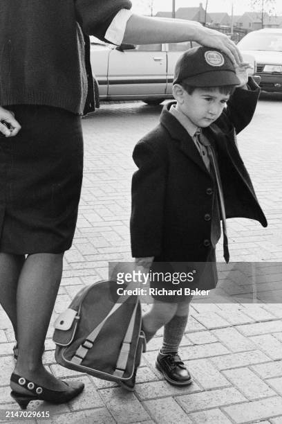 Nineties young schoolboy arrives at Bury Lawn School, on 21st September 1989, in Milton Keynes, England. Bury Lawn School was renamed The Webber...