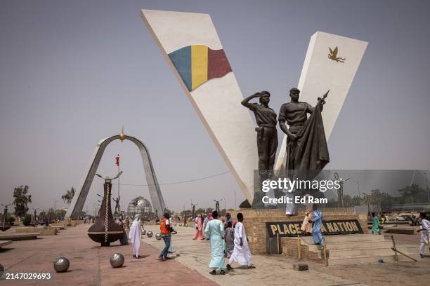 Young people, dressed up for Eid gather, play and eat in N'Djamena's Place de la Nation on April 10, 2024 in N'Djamena, Chad. Eid ul Fitr falls on...