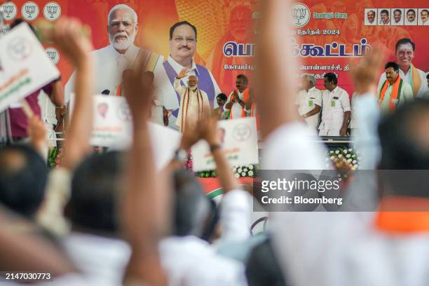 Narendra Modi, India's prime minister, center left, during a campaign rally in Coimbatore, Tamil Nadu, India, on Wednesday, April 10, 2024. The...