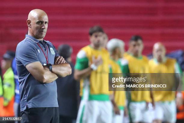 Racing's coach Eduardo Espinel looks on during the Copa Sudamericana group stage first leg match between Argentina's Argentinos Juniors and Uruguay's...