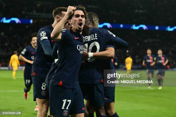 Paris Saint-Germain's Portuguese midfielder Vitinha celebrates after PSG scored an equalizer during the UEFA Champions League quarter final first leg...