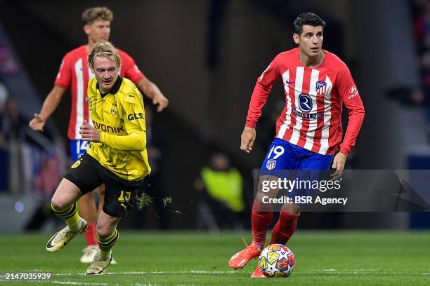 Julian Brandt of Borussia Dortmund and Alvaro Morata of Atletico Madrid during the Quarter-final First Leg - UEFA Champions League 2023/24 match...