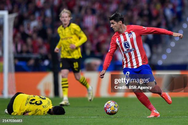 Emre Can of Borussia Dortmund battles for the ball with Alvaro Morata of Atletico Madrid during the Quarter-final First Leg - UEFA Champions League...