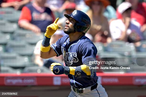 José Caballero of the Tampa Bay Rays crosses the plate after hitting a solo home run in the second inning against the Los Angeles Angels at Angel...