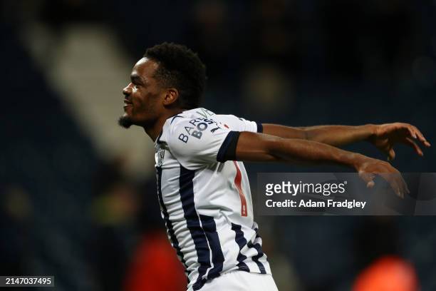 Grady Diangana of West Bromwich Albion excites the West Bromwich Albion fans as he encourages them to celebrate the win after the final whistle in...
