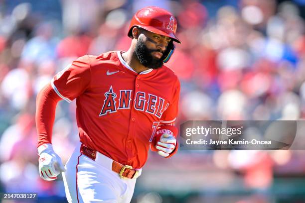 Jo Adell of the Los Angeles Angels rounds the bases after hitting a solo home run in the sixth inning against the Tampa Bay Rays at Angel Stadium of...