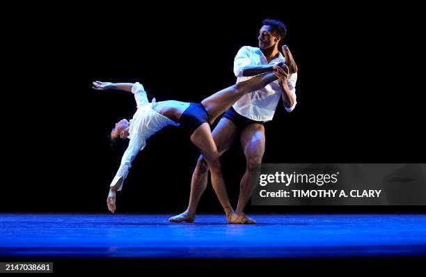 Dance Theatre of Harlem dancers Elias Re and Amanda Smith perform a scene from "Take Me With You" during a dress rehearsal on April 10, 2024 at the...