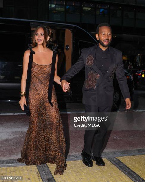 Chrissy Teigen and John Legend are seen on the way to the City Harvest 2024 Gala on April 10, 2024 in New York, New York.