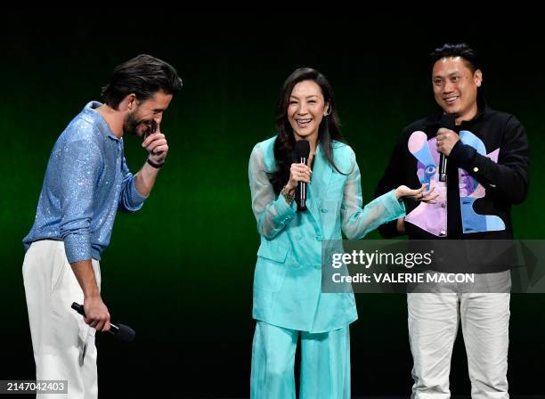 Malaysian actress Michelle Yeoh , British actor Jonathan Bailey and US director Jon M. Chu speak onstage about the movie "Wicked" during the...