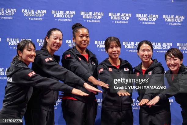 Shuko Aoyama, Ena Shibahara, Naomi Osaka, Mai Hontama, Nao Hibino and head coach Ai Sugiyama of Japan pose for photographs during the draw ceremony...