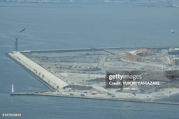 This photo taken on April 2, 2024 shows a view of Yumeshima island, an area of reclaimed land in Osaka, as construction continues at the site for the...