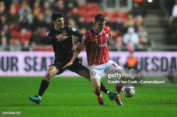 Bristol City's Jason Knight shields the ball from Blackburn Rovers' John Buckley during the Sky Bet Championship match between Bristol City and...