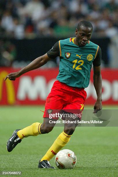 June 6: Lauren. Of Cameroon on the ball during the FIFA World Cup Finals 2002 Group E match between Cameroon and Saudi Arabia at Saitama Stadium on...