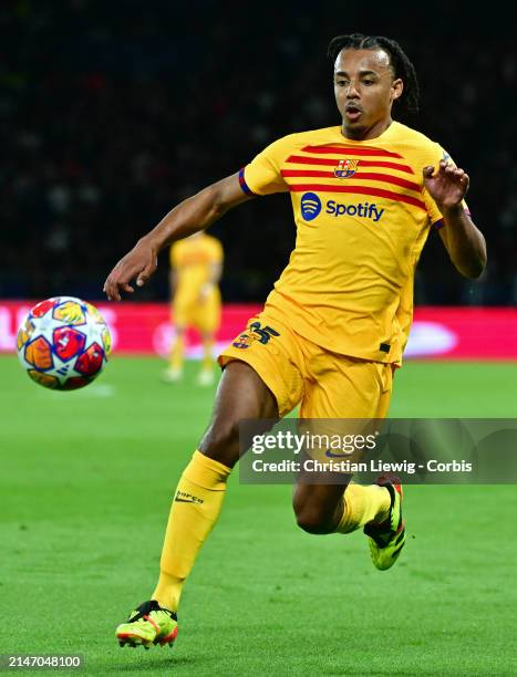 Jules Koundé of Barcelona in action during the UEFA Champions League quarter-final first leg match between Paris Saint-Germain and FC Barcelona at...