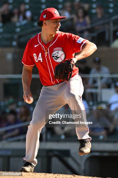 Julian Aguiar of the Cincinnati Reds throws a pitch during the eighth inning of a spring training game against the Colorado Rockies at Salt River...