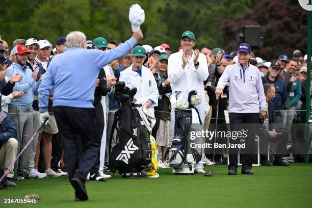 Honorary Starter Jack Nicklaus waves his hat after hitting his tee shot for the Honorary starters ceremony during the first round of Masters...