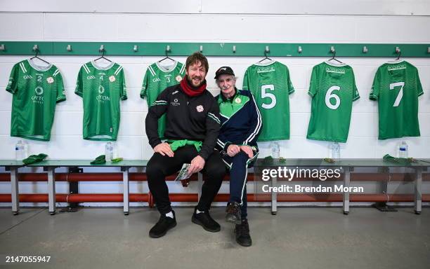 England , United Kingdom - 6 April 2024; London GAA kitman Phil Roche, right, and injured London player Cahir Healy, after preparing the dressing...