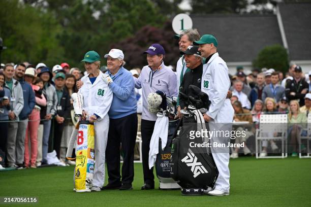 Honorary Starters Jack Nicklaus, Tom Watson and Gary Player of South Africa pose with their caddies and Fred Ridley the Chairman of Augusta National...