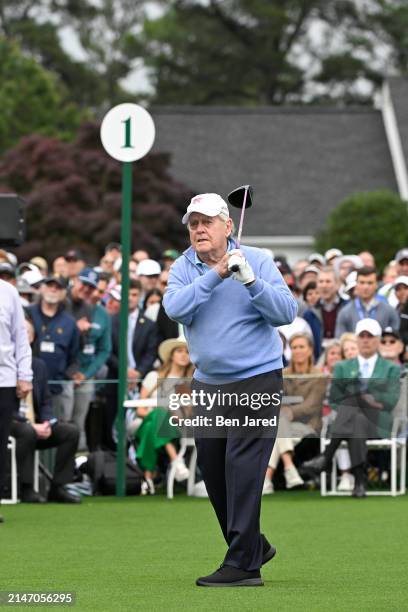 Honorary Starter Jack Nicklaus watches after hitting his tee shot for the Honorary starters ceremony during the first round of Masters Tournament at...