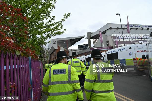 Police officers arrive ahead of the UEFA Europa Conference League quarter-final first leg football match between Aston Villa and Lille at Villa Park...