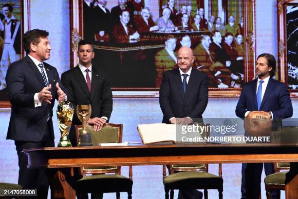 Conmebol's President Alejandro Dominguez , accompanied by Paraguay's President Santiago Peña , FIFA President Gianni Infantino and Uruguay's...