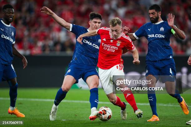 Benfica's Danish forward Casper Tengstedt vies with Marseille's Argentinian defender Leonardo Balerdi during the UEFA Europa League quarter final...