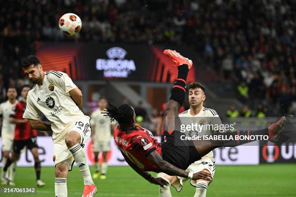 Milan's Portuguese forward Rafael Leao kicks the ball during the UEFA Europa League football match between AC Milan and AS Roma at San Siro Stadium,...