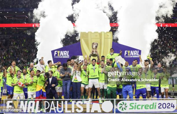 Players of Palmeiras celebrate after winning the Sao Paulo State Championship second leg final between Palmeiras and Santos at Allianz Parque on...