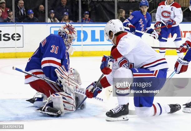 Igor Shesterkin of the New York Rangers makes the first period save on Justin Barron of the Montreal Canadiens at Madison Square Garden on April 07,...