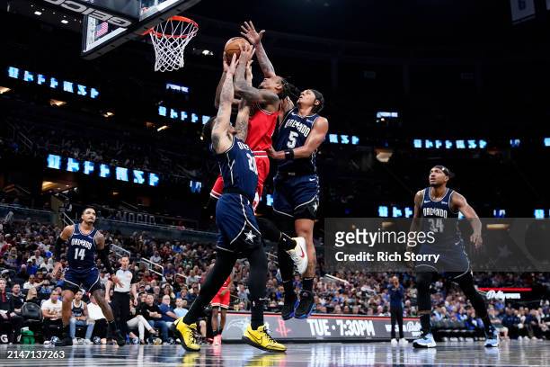DeMar DeRozan of the Chicago Bulls goes up for a shot against Markelle Fultz of the Orlando Magic during the third quarter at Kia Center on April 07,...